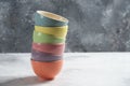 Many of colorful bowls on a gray background Royalty Free Stock Photo