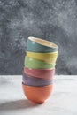 Many of colorful bowls on a gray background Royalty Free Stock Photo