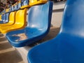 Many colorful chairs in a football stadium Royalty Free Stock Photo