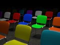 Many colorful chairs standing in a grid