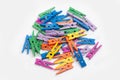 many colorful clothes pegs isolated on white background Royalty Free Stock Photo