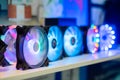 Many colorful coolers, cooling fans with neon LED light at computer exhibition