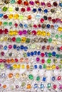 Many colorful crystal chains up for sale in the market