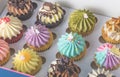 Many colorful cupcakes present in box set celebration Royalty Free Stock Photo