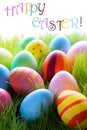 Many Colorful Easter Eggs On Green Grass With Text Happy Easter Royalty Free Stock Photo