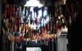 Many colorful flags under the ceiling of the old temple. Garlands in a buddhist temple Royalty Free Stock Photo