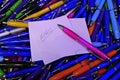 Many colorful, glossy ballpoint pens Royalty Free Stock Photo