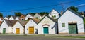 Many colorful old traditional wine cellers in Villanykovesd in a hungarian wine region called Villany panoramic Royalty Free Stock Photo