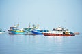 Many Colorful pastel fishing boats floating in the ocean in Paracas Peru Royalty Free Stock Photo