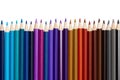 Many colorful pencils in a row isolated on white background Royalty Free Stock Photo