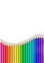 Many colorful pencils in wave shape with white background Royalty Free Stock Photo