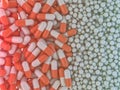 Many colorful pills abstract background. 3D