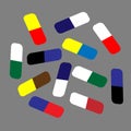 Many colorful pills isolated on Grey Royalty Free Stock Photo