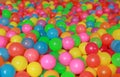 Many colorful plastic balls in a kids` ball pit at a playground Royalty Free Stock Photo