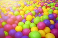 Many colorful plastic balls in a kids& x27; ballpit at a playground. Royalty Free Stock Photo