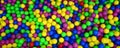 Many colorful plastic balls in a kids& x27; ballpit at a playground. Royalty Free Stock Photo