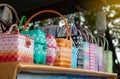Many colorful plastic baskets in shop sheds