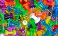 Many colorful push pins, isolated Royalty Free Stock Photo