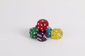 Colorful sparkling dices on the table Royalty Free Stock Photo