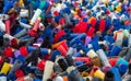 Many colorful spent shotgun shells displayed in front of a shooting range in the UK. Many different colors and gauges, concepts of