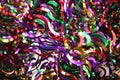 Many colorful tinsels as background, closeup view Royalty Free Stock Photo