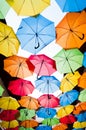 Many colorful umbrellas against the sky in city settings. Kosice, Slovakia Royalty Free Stock Photo