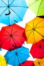 Many colorful umbrellas against the sky in city settings. Kosice, Slovakia Royalty Free Stock Photo