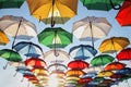 Many colorful umbrellas decorate the street Royalty Free Stock Photo