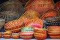 Many colorful weaved baskets up for sale