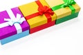 Many Colorful Wrapped Up Gift Boxes In Line Together Against White Background Royalty Free Stock Photo