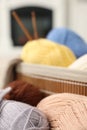 Many colorful yarns on blurred background, closeup Royalty Free Stock Photo