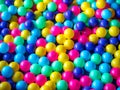 Many colour plastic balls, children`s party, a games room, a box filled with small colored balls