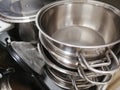 Cooking pan stacked in a kitchen drawer Royalty Free Stock Photo