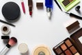 Many cosmetics for makeup and beauty of women on white background.