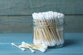 Many cotton buds on light blue wooden table Royalty Free Stock Photo