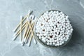 Many cotton buds on light grey marble table, flat lay Royalty Free Stock Photo