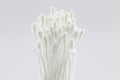 Many Cotton swabs in the glass on white background Royalty Free Stock Photo