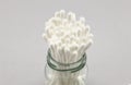 Many Cotton swabs in the glass on white background Royalty Free Stock Photo