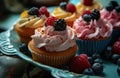 many cupcakes with cakes and berries in plate Royalty Free Stock Photo