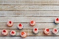 Many cupcakes on a wooden white table from above Royalty Free Stock Photo