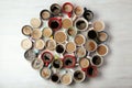 Many cups with tasty aromatic coffee on wooden table