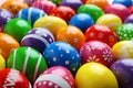 Many decorated Easter eggs as background