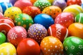 Many decorated Easter eggs as background