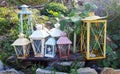 Decorative colorful candle lanterns on the garden