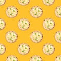 Many delicious cheese pizzas on yellow background, flat lay. Seamless pattern design