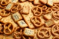 Many delicious crackers as background, closeup view