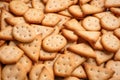 Many delicious crackers as background, closeup Royalty Free Stock Photo