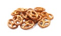 Many delicious pretzel crackers isolated on white Royalty Free Stock Photo