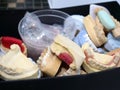 Many dental models in a box laying on a white table