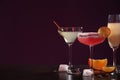 Many different alcoholic drinks on table against dark background. Space for text Royalty Free Stock Photo